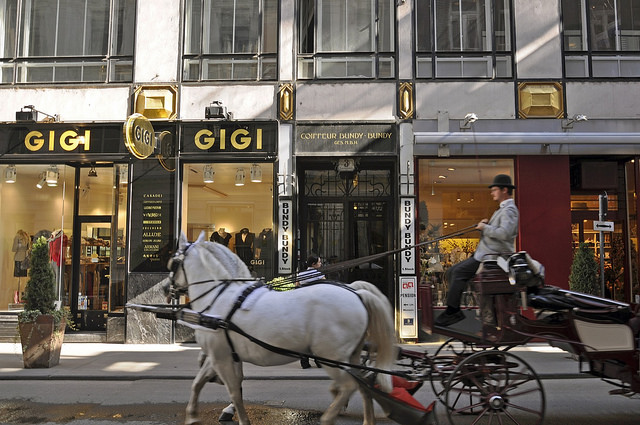 A classic Viennese horse and carriage, a Fiaker, in motion in Vienna