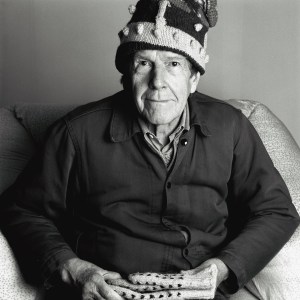Portrait of John Cage wearing a crown