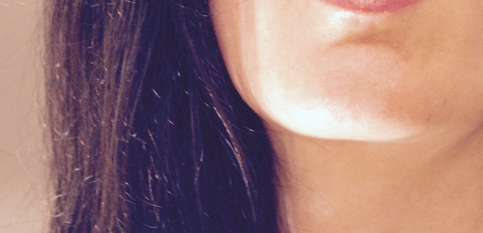Closeup of beautiful woman with lips parted to sing or speak